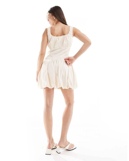 The Frolic White Exclusive Poplin Ruched Bust Dropped Waist Puffball Mini Dress