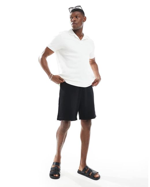 Pantalones Cortos Negros Básicos Extragrandes De Largo Medio De ASOS de hombre de color Black
