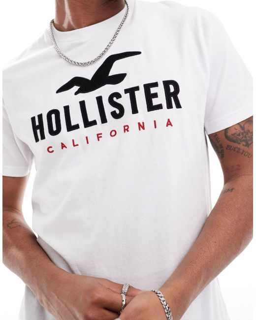 Camiseta técnica blanca con logo Hollister de hombre de color White