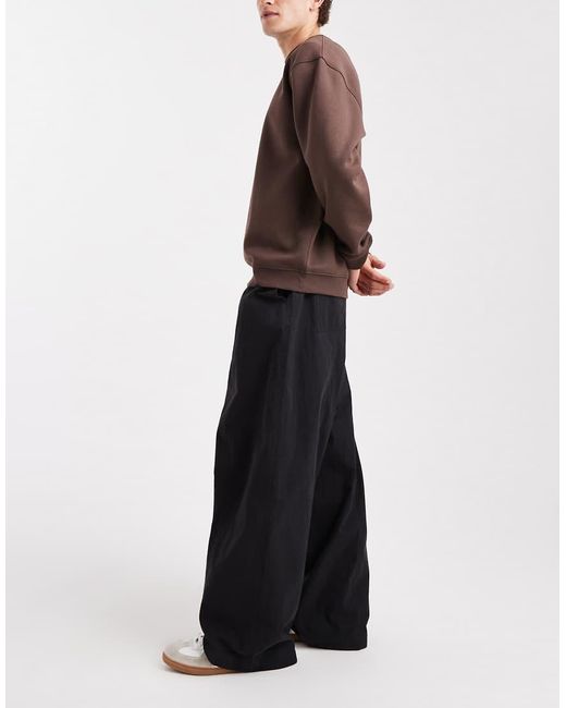 Pantalones Negros Holgados Extragrandes De ASOS de hombre de color Black