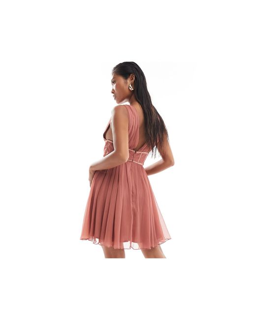 Asos design petite - vestito corto a corsetto rosa polvere con pieghe e scollo profondo di ASOS in Red
