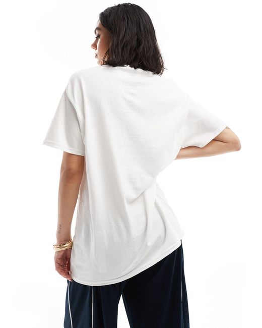 T-shirt oversize bianca con grafica "nasa" su licenza di ASOS in Blue