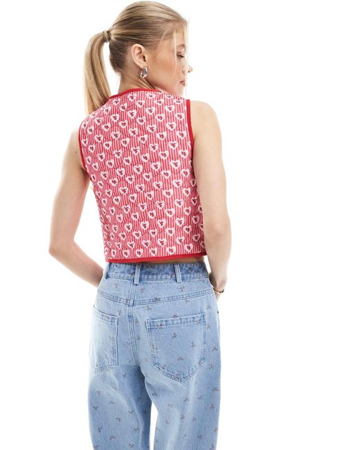 The Frolic Red – exklusiv – wendbare weste mit streifen, blumen-print und gestepptem herzmuster