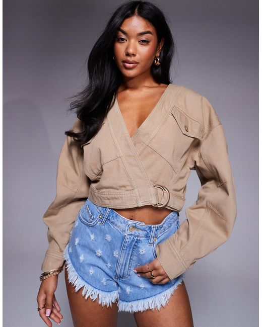 Asos x the sourced collection - mini-short en jean effet vieilli ASOS en coloris Blue