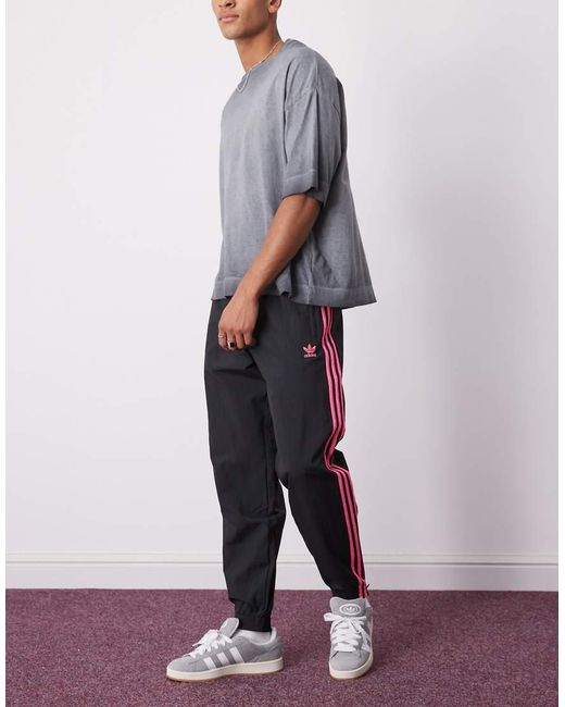 Adidas Originals White Firebird Track Pants for men