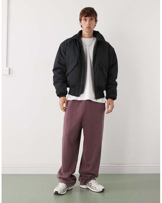 Chaqueta Bomber Negra Extragrande Con Cuello De Solapas De Weekday de hombre de color Black