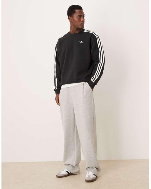 Adidas Originals Black Three Stripe Oversized Sweatshirt for men