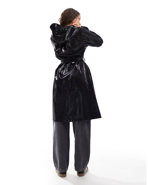 Rains black raincoat best sale