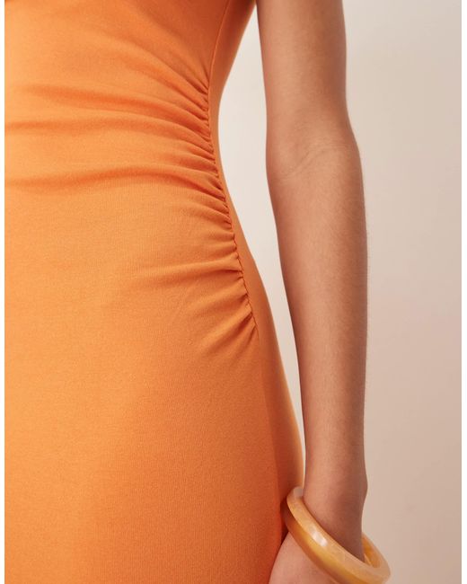Robe longue ajustée en modal mélangé doux à col montant Mango en coloris Orange