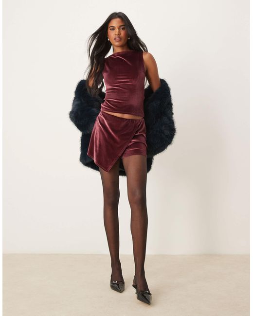 RED WRAP SKORT WITH BRAIDED DETAIL WRAP PANELISTS