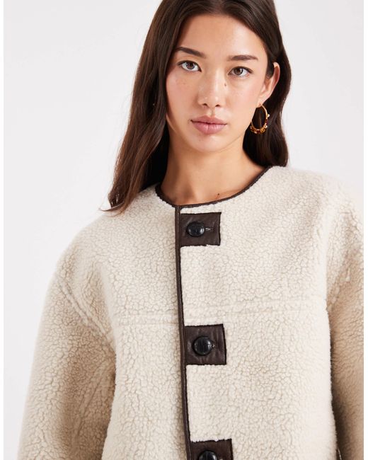 Pieces Blue – wendebare jacke aus teddyfell und kunstleder