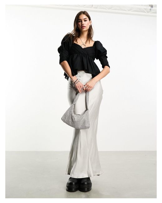 Reclaimed (vintage) White – bluse mit puffärmeln und asymmetrischem saum