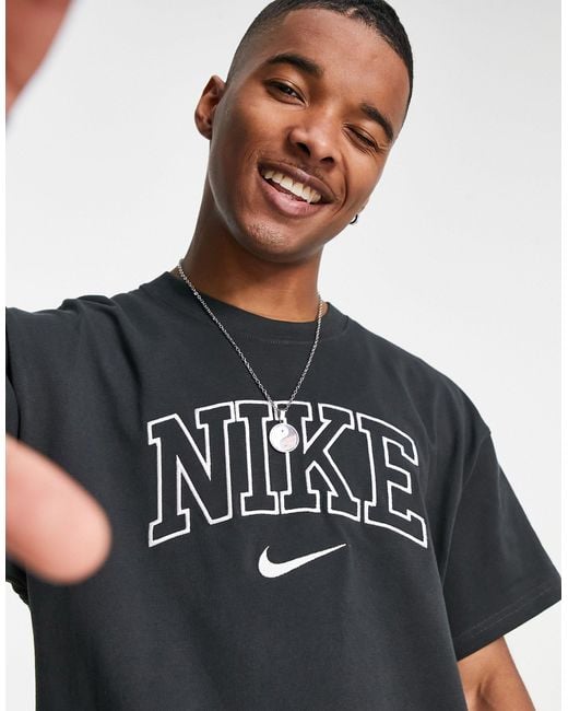 Camiseta extragrande con diseño retro, lavado negro y logo Nike de hombre  de color Negro | Lyst