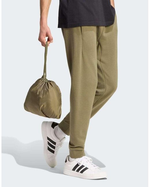 Adidas Originals Green Essentials Packable Insulated Jacket for men