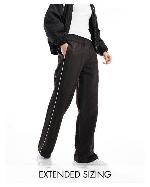 ASOS Black baggy Nylon Track Pants for men