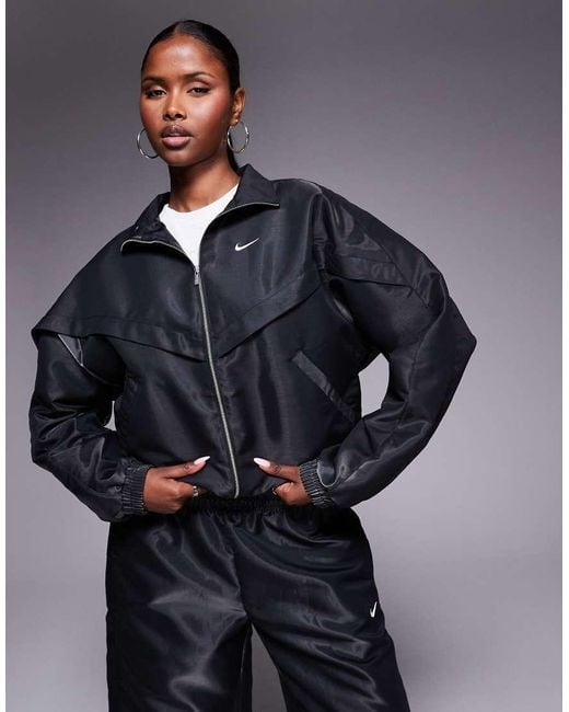 Nike Windrunner Liquid Shine in het Blue