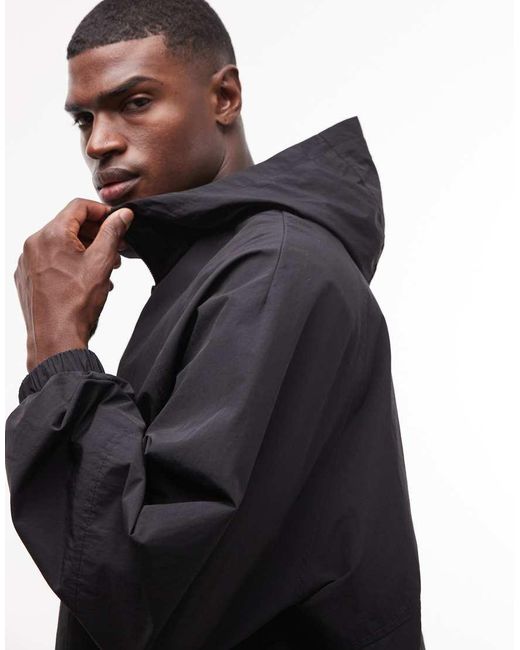 ASOS Blue Stormmaxtm Water Repellent Packaway Rain Jacket for men