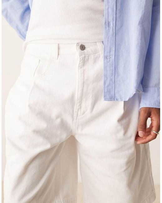 Pantalones Cortos Vaqueros De Corte Alargado Con Pinzas Y Bolsillos De ASOS de hombre de color Blue