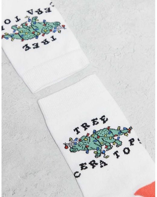 Calcetines Blancos Para Navidad Con Estampado Gráfico De Dinosaurio De ASOS de hombre de color White