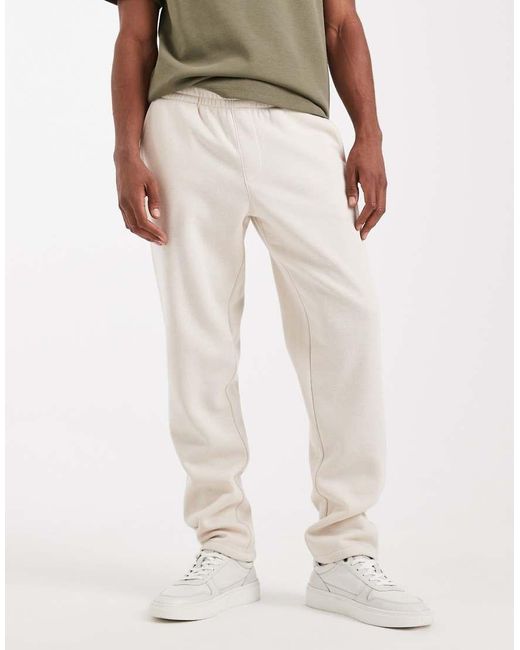 JJ Rebel loose fit chino in beige | ASOS