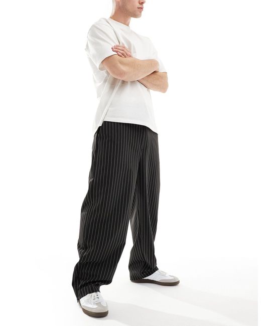 Pantalon large habillé à rayures et taille style caleçon Bershka pour homme en coloris Black