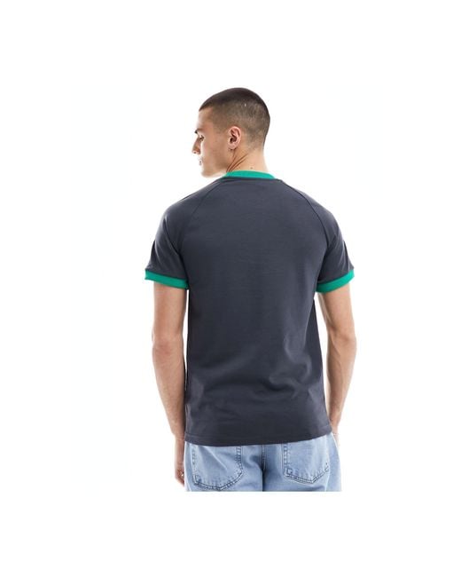 Adidas football - jamaica og - t-shirt à 3 bandes Adidas Originals pour homme en coloris Blue