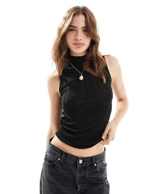 Top Sin Mangas Con Cuello Alto De Mango de color Black
