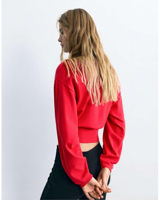 Pull à col bateau rayé Pull&Bear en coloris Red
