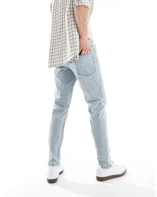 ASOS Blue Tapered Jeans With Rips for men