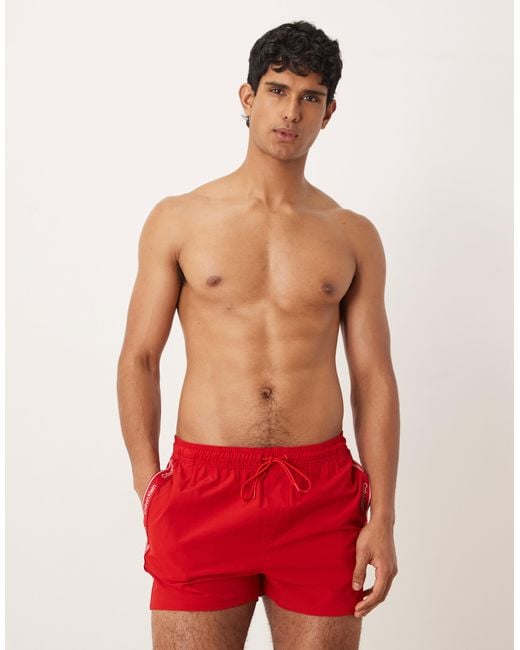Calvin Klein Red Side Script Logo Drawstring Swim Shorts for men