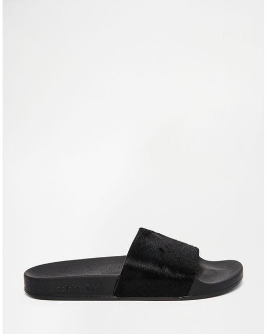 adidas Originals Adilette Pony Hair Slider Flat Sandals in Black | Lyst  Canada