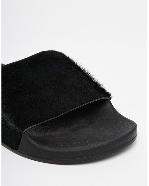 Originals Adilette Pony Hair Slider Flat Sandals in Black | Lyst