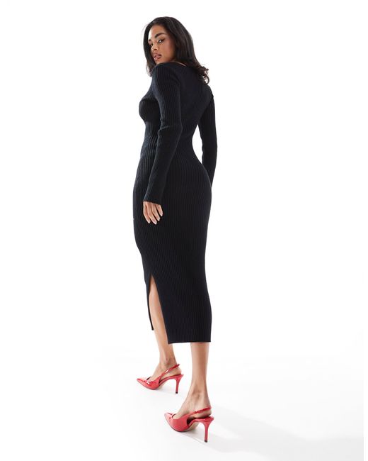 Robe pull longueur mollet en maille côtelée douce avec col v In The Style en coloris Black