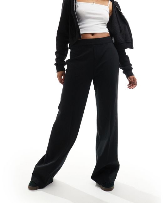 Pantalon ample en maille point Spanx en coloris Black