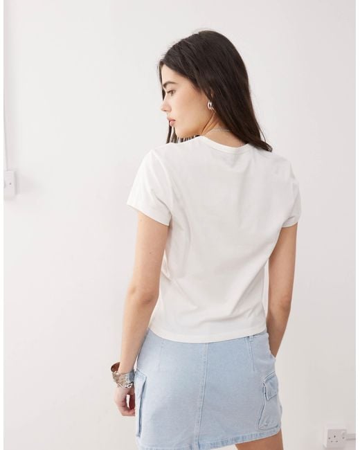 Jupe cargo en jean style rétro - délavé Karlkani en coloris Pink