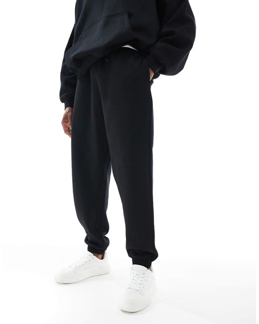 ASOS – essentials – oversize-jogginghose in Blue für Herren