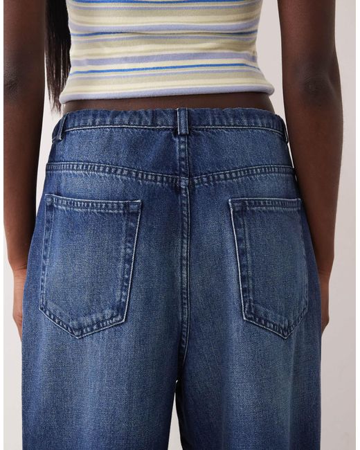 Jean large à enfiler - moyen délavé ASOS en coloris Blue