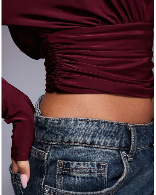 Top asymétrique près du corps à manches longues et taille cintrée - bordeaux ASOS en coloris Purple