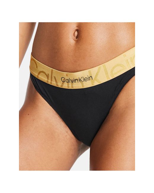 Calvin Klein Embossed Icon Cotton Blend Thong in Black | Lyst