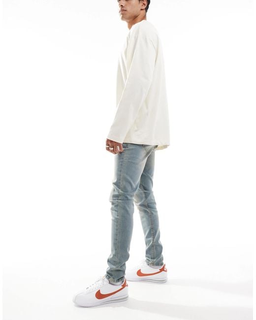 Don't Think Twice Dtt – sehr eng geschnittene stretch-jeans in White für Herren