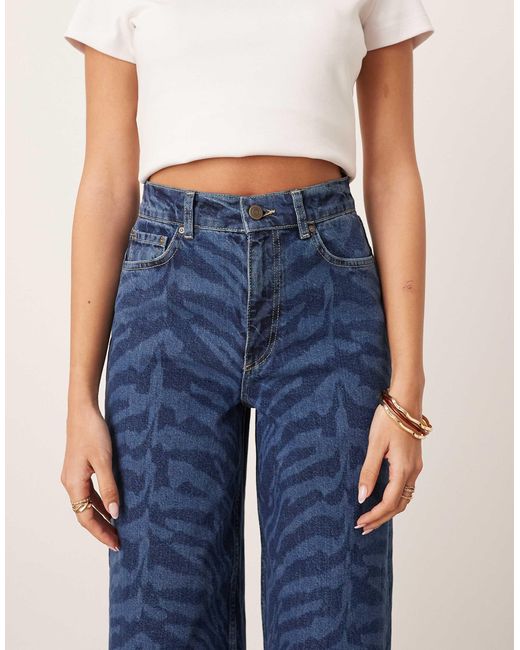 Parker - jean ample à taille haute et revers avec imprimé tigré - bleu ARRANGE en coloris Blue