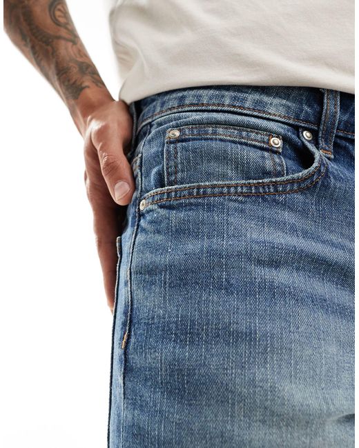 ASOS Blue Stretch Tapered Jeans for men