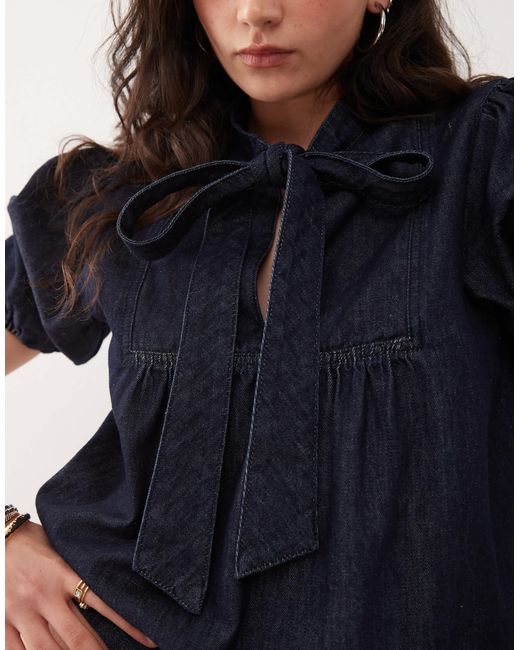 Top en denim à manches bouffantes et encolure nouée - indigo clair délavé Reclaimed (vintage) en coloris Blue