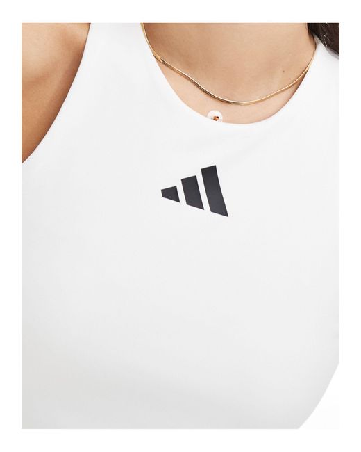 Adidas - tennis - débardeur avec découpe en y Adidas Originals en coloris White