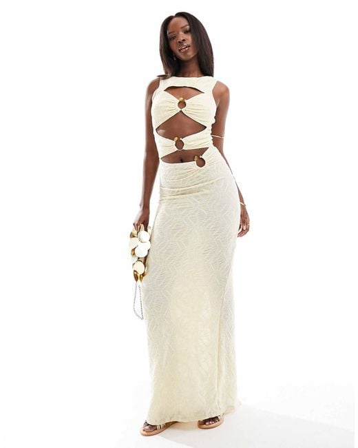 Robe longue texturee a decoupes avec anneau creme South Beach en coloris Blanc Lyst