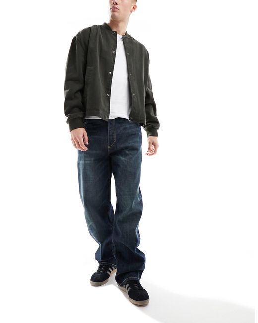 Galaxy - jeans larghi color palude di Weekday in Black da Uomo