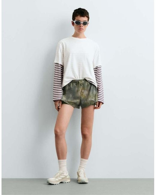 Oysho Green Printed Mid Rise 2-In-1 Technical Shorts