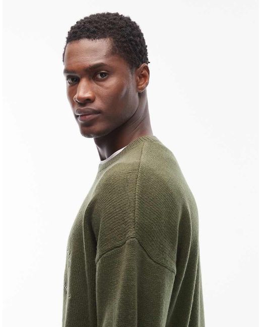 ASOS Green Relaxed Knitted Christmas Jumper With Merry Christmas Ya Filthy Animal Slogan for men