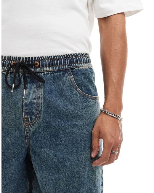 Short en jean mi-long coupe cargo ample à enfiler - moyen délavé ASOS pour homme en coloris Blue