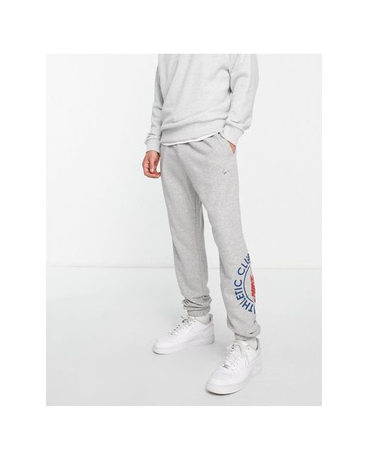 Nike Athletic Club Retro Logo Casual Fit Cuffed Sweatpants in Gray